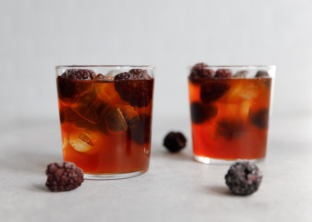 two glassed of blackberry iced tea