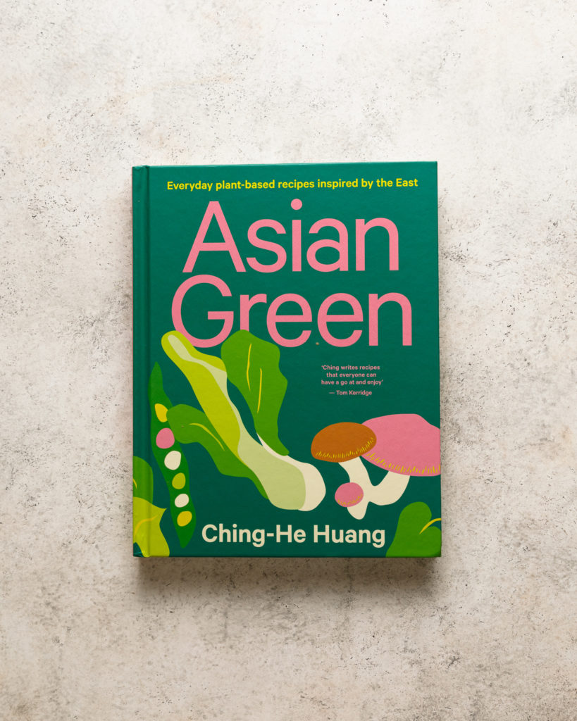 Asian Green cookbook on a beige textured backdrop