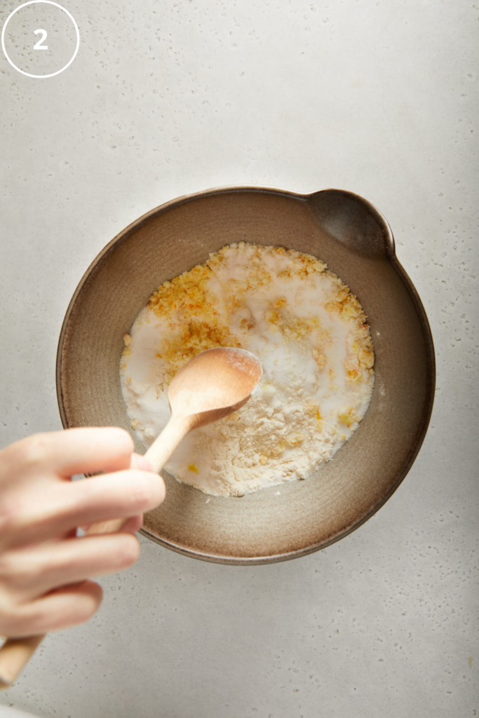 mixing bowl with dry flour and sugar in 