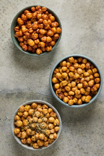 Three bowls of crispy chickpeas seasoned with BBQ, sweet chilli, and za’atar spice.