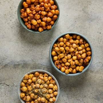 Three bowls of crispy chickpeas seasoned with BBQ, sweet chilli, and za’atar spice.